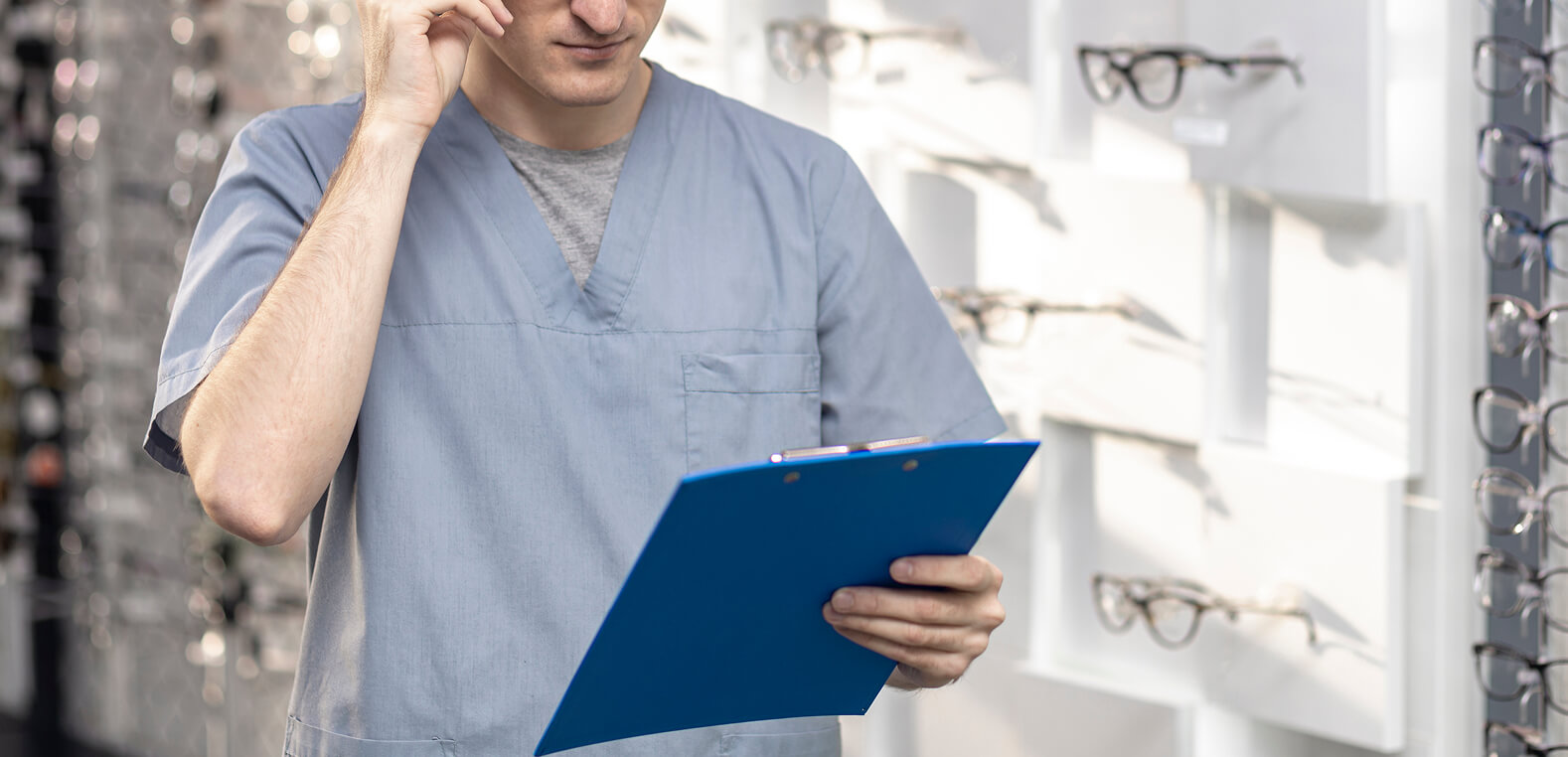 front-view-man-wearing-glasses-looking-notepad 1 (1)